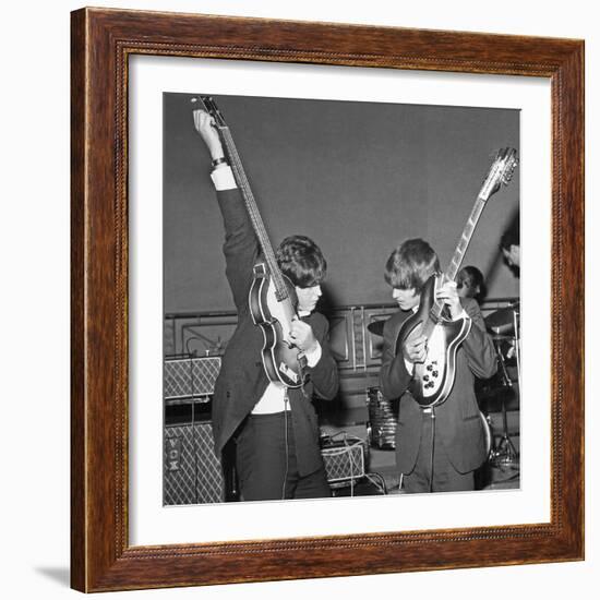 Paul Mccartney and George Harrison Tune their Guitars-Associated Newspapers-Framed Photo