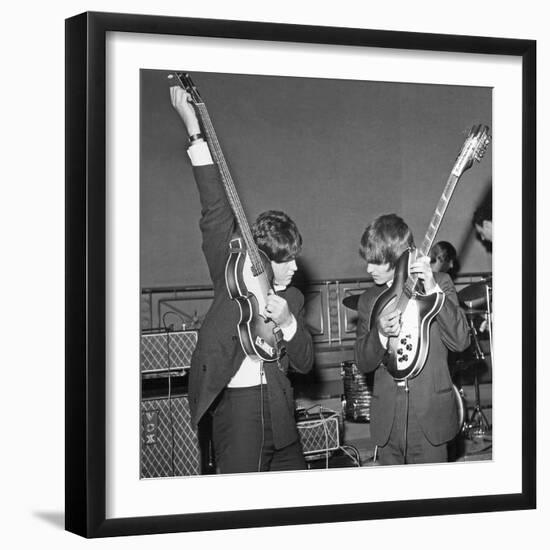 Paul Mccartney and George Harrison Tune their Guitars-Associated Newspapers-Framed Photo