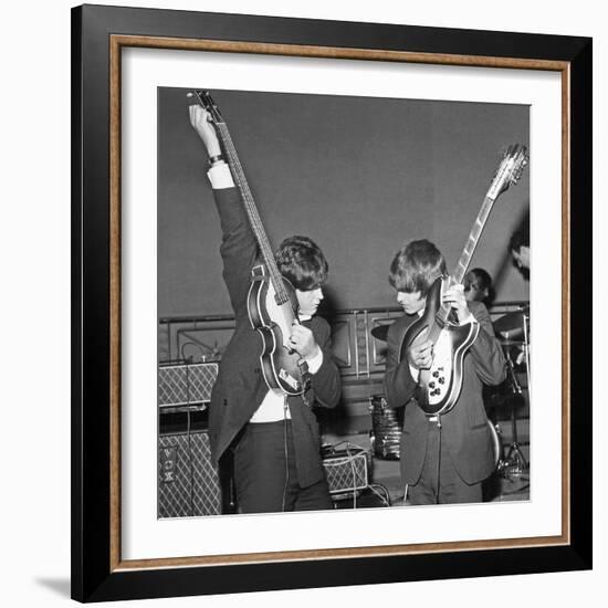 Paul Mccartney and George Harrison Tune their Guitars-Associated Newspapers-Framed Photo