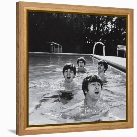 Paul McCartney, George Harrison, John Lennon and Ringo Starr Taking a Dip in a Swimming Pool-John Loengard-Framed Premier Image Canvas