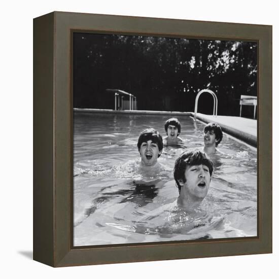 Paul McCartney, George Harrison, John Lennon and Ringo Starr Taking a Dip in a Swimming Pool-John Loengard-Framed Premier Image Canvas