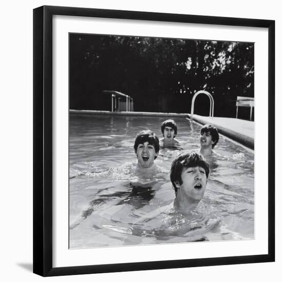 Paul McCartney, George Harrison, John Lennon and Ringo Starr Taking a Dip in a Swimming Pool-null-Framed Photographic Print