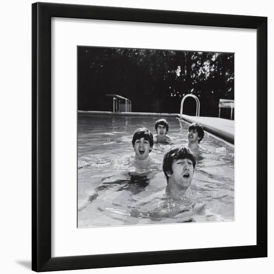 Paul McCartney, George Harrison, John Lennon and Ringo Starr Taking a Dip in a Swimming Pool-null-Framed Premium Photographic Print