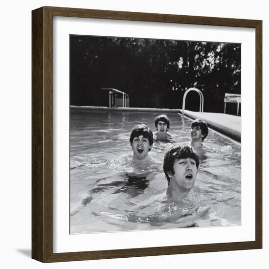 Paul McCartney, George Harrison, John Lennon and Ringo Starr Taking a Dip in a Swimming Pool-null-Framed Premium Photographic Print