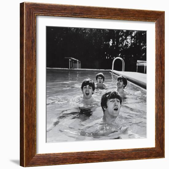 Paul McCartney, George Harrison, John Lennon and Ringo Starr Taking a Dip in a Swimming Pool-null-Framed Premium Photographic Print