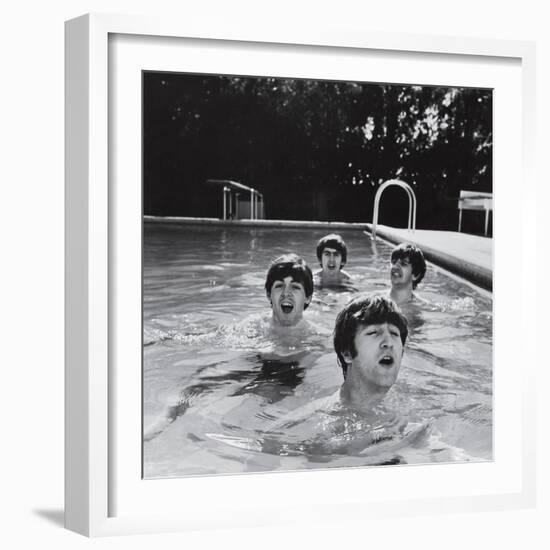 Paul McCartney, George Harrison, John Lennon and Ringo Starr Taking a Dip in a Swimming Pool-null-Framed Premium Photographic Print