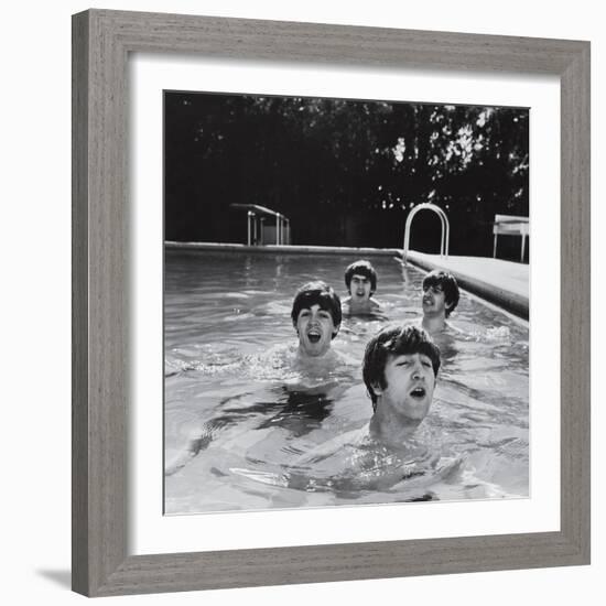 Paul McCartney, George Harrison, John Lennon and Ringo Starr Taking a Dip in a Swimming Pool-null-Framed Photographic Print