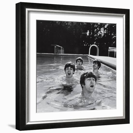 Paul McCartney, George Harrison, John Lennon and Ringo Starr Taking a Dip in a Swimming Pool-null-Framed Photographic Print