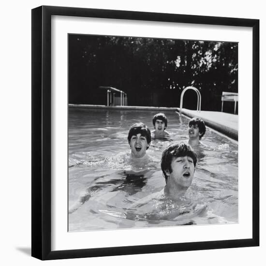 Paul McCartney, George Harrison, John Lennon and Ringo Starr Taking a Dip in a Swimming Pool--Framed Photographic Print