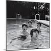 Paul McCartney, George Harrison, John Lennon and Ringo Starr Taking a Dip in a Swimming Pool-null-Mounted Photographic Print