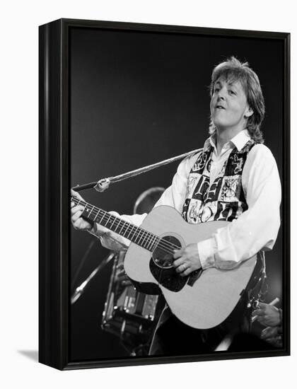 Paul McCartney Playing Guitar on Stage-null-Framed Premier Image Canvas