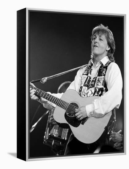 Paul McCartney Playing Guitar on Stage-null-Framed Premier Image Canvas