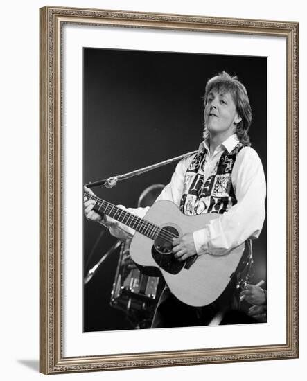 Paul McCartney Playing Guitar on Stage-null-Framed Premium Photographic Print