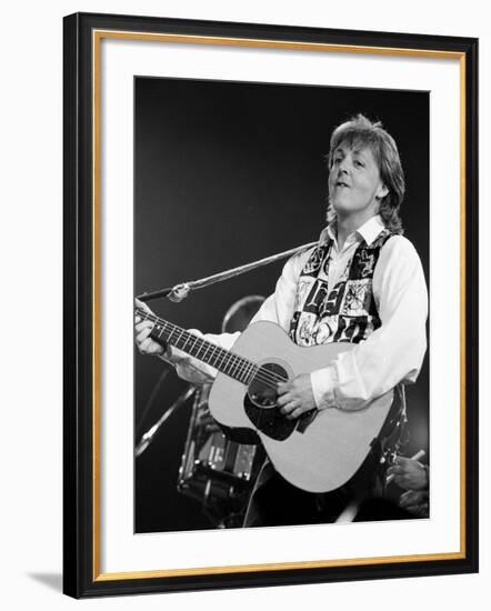 Paul McCartney Playing Guitar on Stage-null-Framed Premium Photographic Print