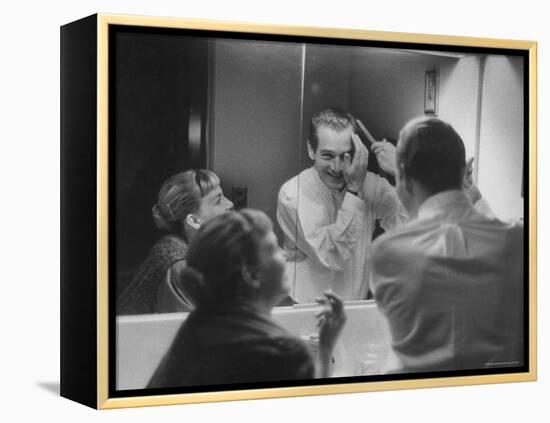 Paul Newman Talking to His Wife Joanne Woodward While Getting Dressed-Gordon Parks-Framed Premier Image Canvas