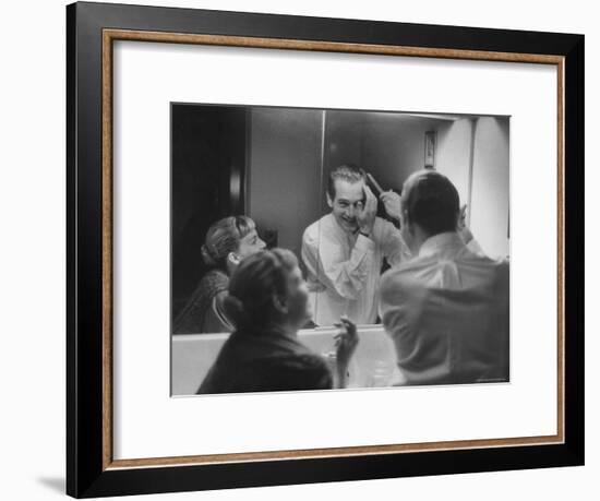 Paul Newman Talking to His Wife Joanne Woodward While Getting Dressed-Gordon Parks-Framed Premium Photographic Print