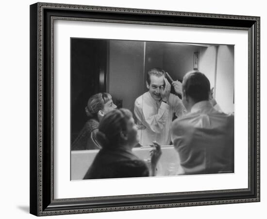 Paul Newman Talking to His Wife Joanne Woodward While Getting Dressed-Gordon Parks-Framed Premium Photographic Print