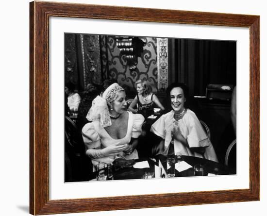 Paulette Goddard, Smiling, Sitting at after Opening Party for Bolshoi Ballet-Alfred Eisenstaedt-Framed Premium Photographic Print