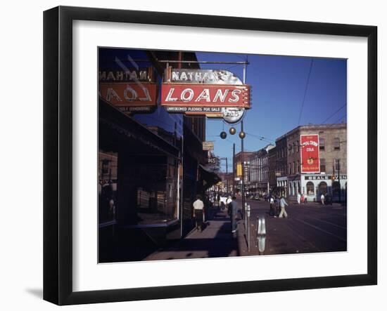 Pawnbroker Shop Sign Prominent Along a Street in Memphis-null-Framed Photographic Print