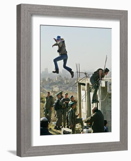 Peace Activist Leaps over Israeli Border Police Trying to Prevent Demolition of House, Jerusalem-null-Framed Photographic Print