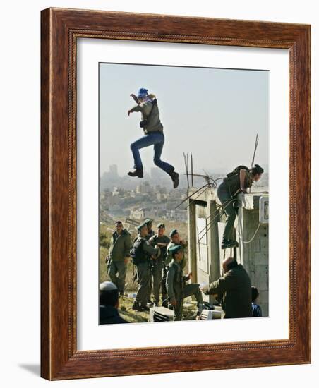 Peace Activist Leaps over Israeli Border Police Trying to Prevent Demolition of House, Jerusalem-null-Framed Photographic Print