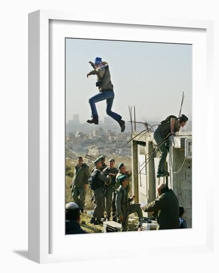 Peace Activist Leaps over Israeli Border Police Trying to Prevent Demolition of House, Jerusalem-null-Framed Photographic Print