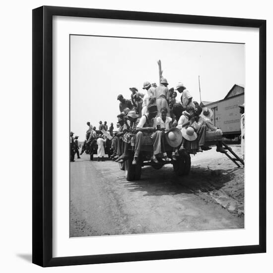 Peach pickers being driven to the orchards in Muscella, Georgia, 1936-Dorothea Lange-Framed Photographic Print