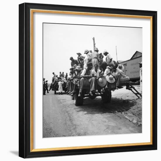 Peach pickers being driven to the orchards in Muscella, Georgia, 1936-Dorothea Lange-Framed Photographic Print