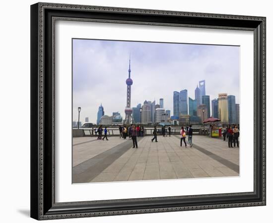 Pedestrians and Tourists on the Bund, the Futuristic Skyline of Pudong across the Huangpu River Bey-Amanda Hall-Framed Photographic Print