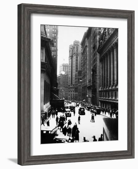 Pedestrians and Traffic on Wall Street in Front of the New York Stock Exchange-null-Framed Photographic Print