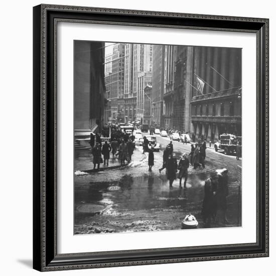 Pedestrians Crossing Slushy Intersection at Wall Street-Walker Evans-Framed Photographic Print