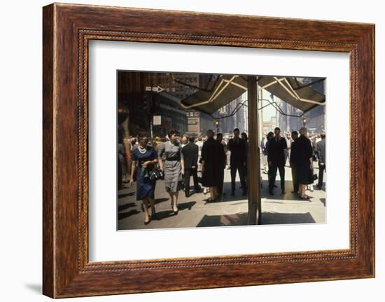 Pedestrians Reflected in Glass on 7th Ave in the Garment District, New York, New York, 1960-Walter Sanders-Framed Photographic Print