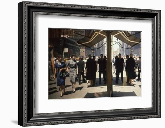 Pedestrians Reflected in Glass on 7th Ave in the Garment District, New York, New York, 1960-Walter Sanders-Framed Photographic Print