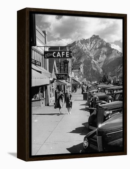Pedestrians Walking Along Main Street in Resort Town with Cascade Mountain in the Background-Andreas Feininger-Framed Premier Image Canvas