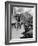 Pedestrians Walking Along Main Street in Resort Town with Cascade Mountain in the Background-Andreas Feininger-Framed Photographic Print