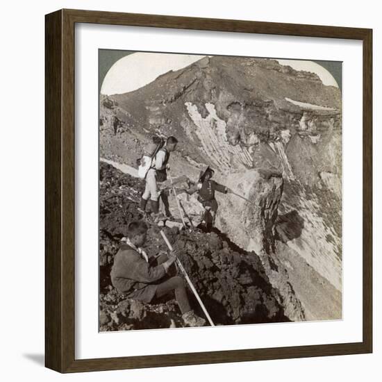 Peering from the Lava Encrusted Rim Down into Mount Fuji's (Fujiyama) Crater, Japan, 1904-Underwood & Underwood-Framed Photographic Print
