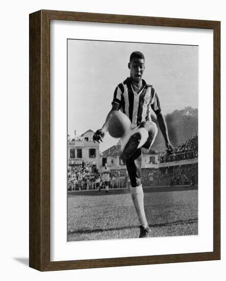 Pele, the Brazilian Soccer Champion in 1965-null-Framed Photo