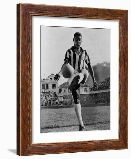 Pele, the Brazilian Soccer Champion in 1965-null-Framed Photo