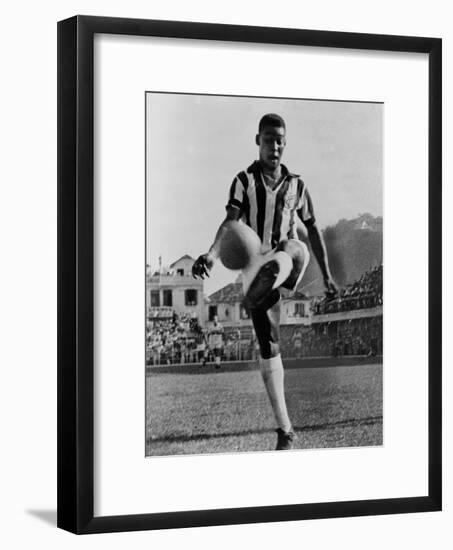 Pele, the Brazilian Soccer Champion in 1965-null-Framed Photo