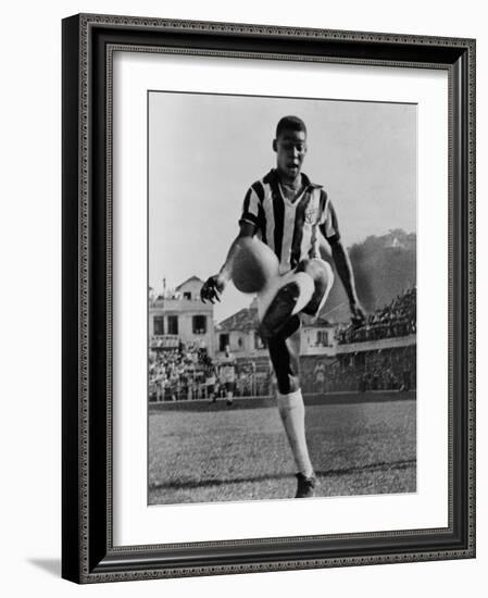 Pele, the Brazilian Soccer Champion in 1965-null-Framed Photo