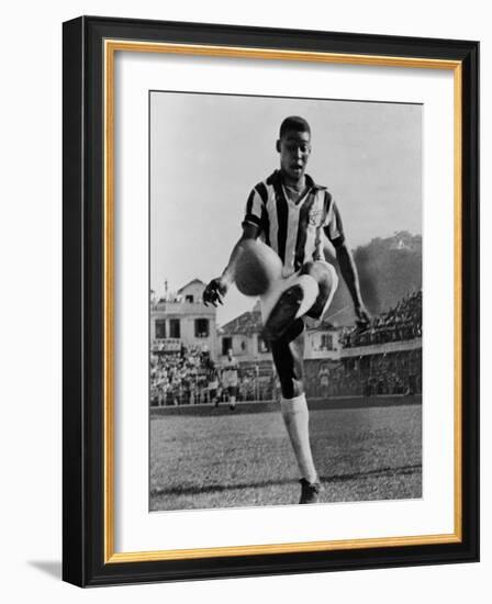 Pele, the Brazilian Soccer Champion in 1965-null-Framed Photo