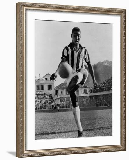 Pele, the Brazilian Soccer Champion in 1965-null-Framed Photo