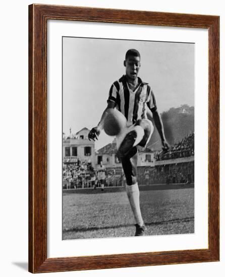 Pele, the Brazilian Soccer Champion in 1965-null-Framed Photo