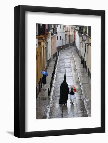 Penitents During Semana Santa (Holy Week) Along Rainy Street, Seville, Andalucia, Spain, Europe-Stuart Black-Framed Photographic Print