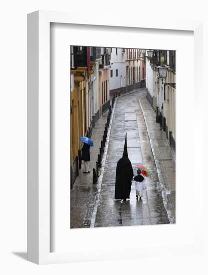 Penitents During Semana Santa (Holy Week) Along Rainy Street, Seville, Andalucia, Spain, Europe-Stuart Black-Framed Photographic Print