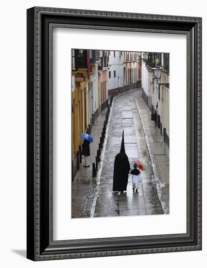 Penitents During Semana Santa (Holy Week) Along Rainy Street, Seville, Andalucia, Spain, Europe-Stuart Black-Framed Photographic Print