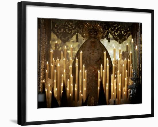 Penitents Follow La Macarena During a Holy Week Procession-null-Framed Photographic Print