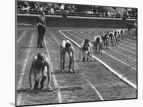 Penn Relay Races, College Students Crouched in Starting Position-George Silk-Mounted Photographic Print