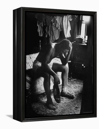 Pensive Portrait of Young African American Alone in His Room from Youth Essay-Gordon Parks-Framed Premier Image Canvas