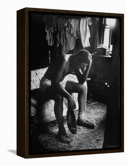 Pensive Portrait of Young African American Alone in His Room from Youth Essay-Gordon Parks-Framed Premier Image Canvas